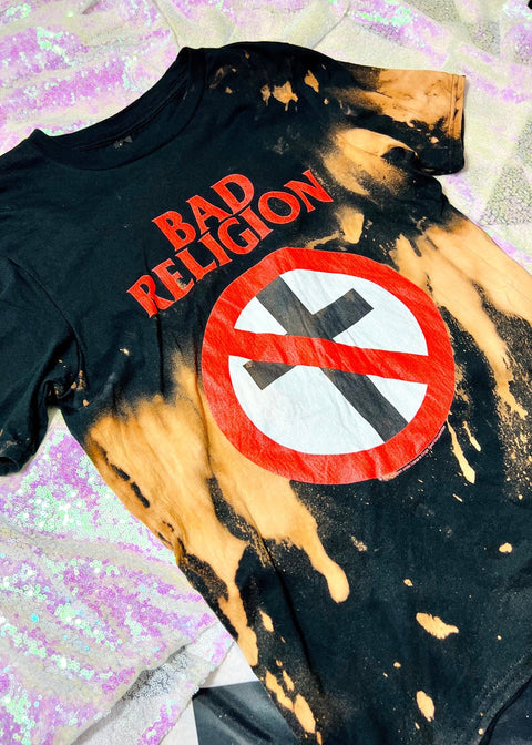 bad religion bleach dye band t shirt on a sequin background close up