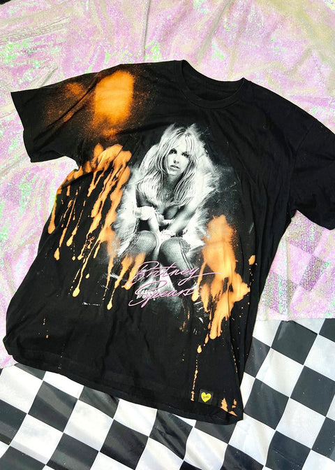 britney spears bleach dye t shirt on a sequin background