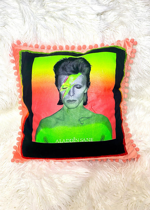 david bowie throw pillow on a white furry background front view