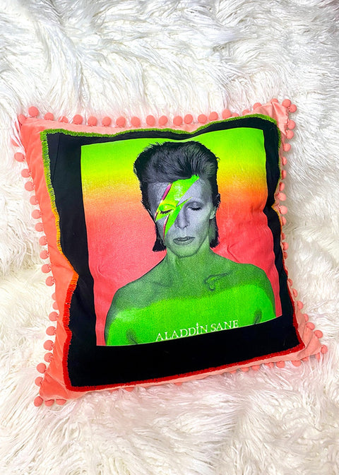 david bowie throw pillow on a white furry background front view