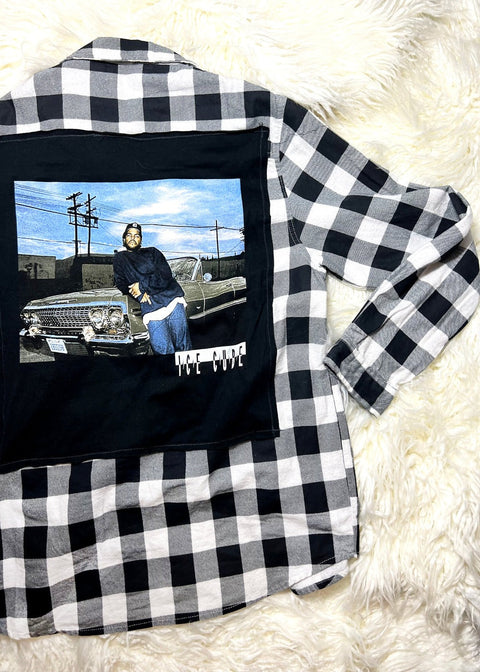 ice cube flannel on a white furry background side view