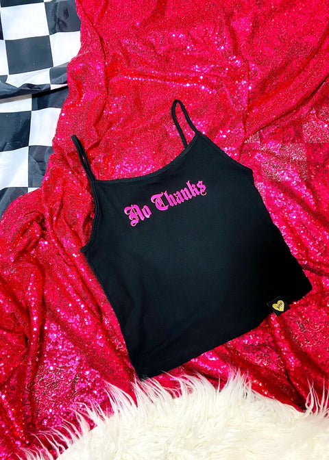 black spaghetti strap tank top on a hot pink sequin background