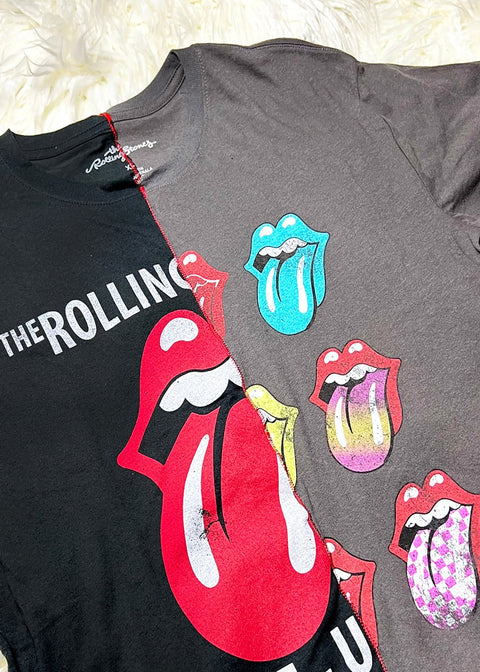 rolling stones t shirt on a white furry background close up