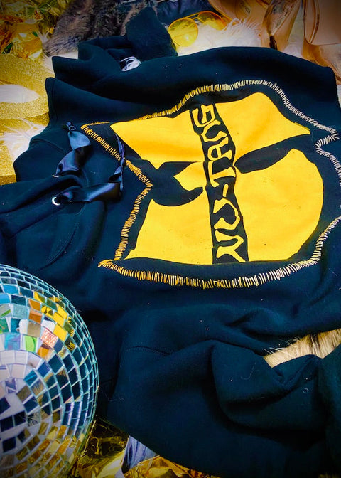 black hoodie with yellow wu-tang logo sewn on front stitching detail with disco ball